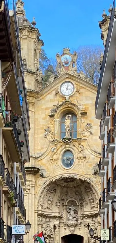 Historic European church amidst colorful street buildings.