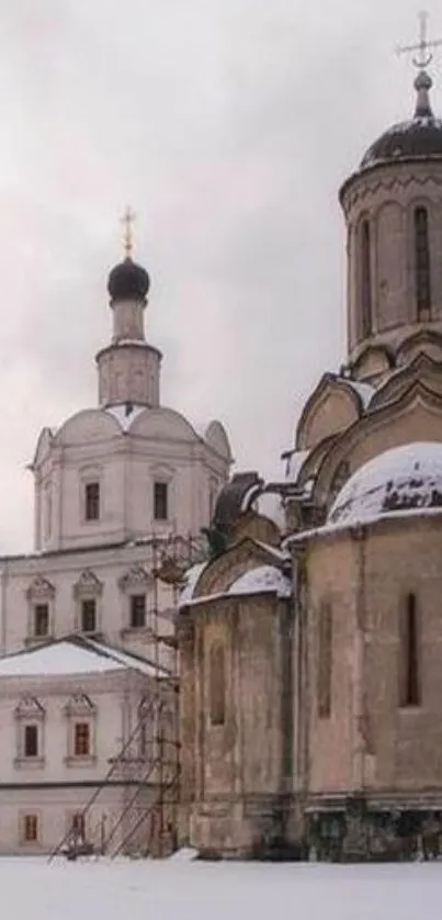 Snow-covered historic cathedral with stunning architecture.