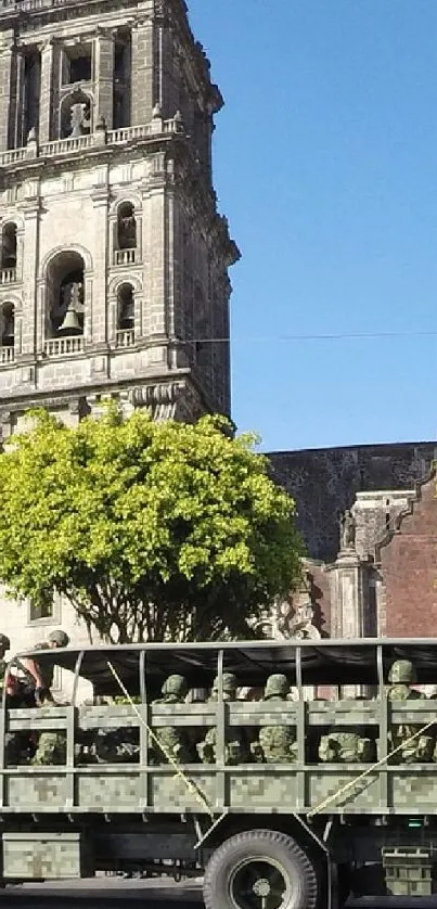 Historic city landscape with military vehicles and architecture.