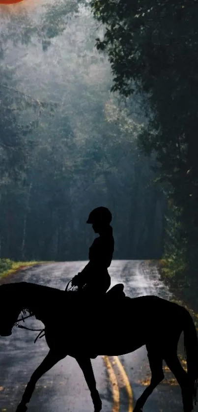 Horse rider silhouette on misty forest road wallpaper.