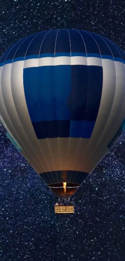 Hot air balloon against a starry night sky.