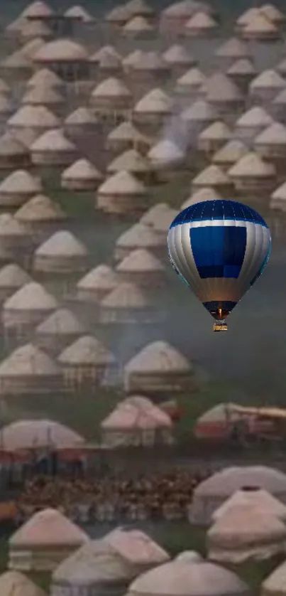 Hot air balloon floating over numerous yurts in a serene landscape.