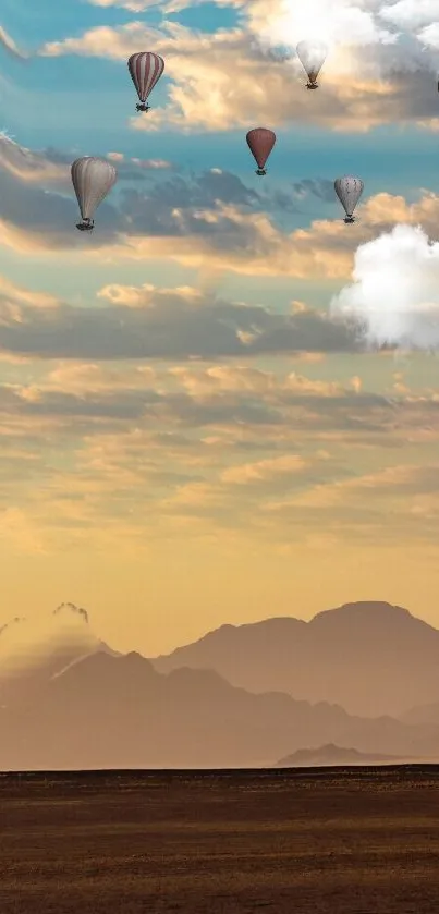 Hot air balloons float against a sunset sky with mountains, creating a peaceful scene.
