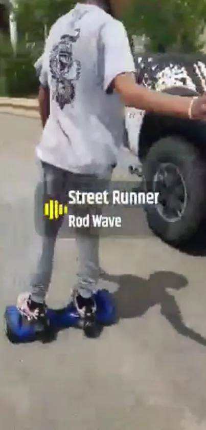 Person riding hoverboard in street with active urban vibe.