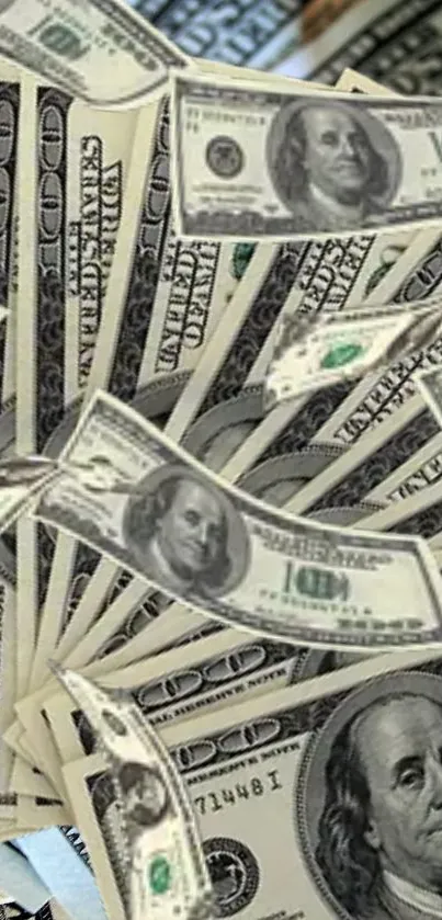 High-definition wallpaper of hundred dollar bills cascading elegantly.