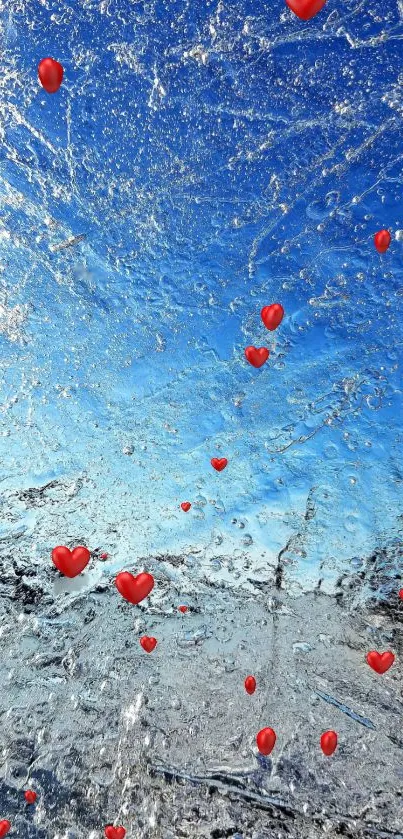 Red hearts over icy blue wallpaper background.