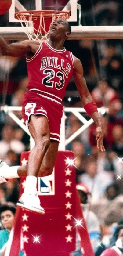 Basketball player performing an iconic dunk during a game with a dynamic background.