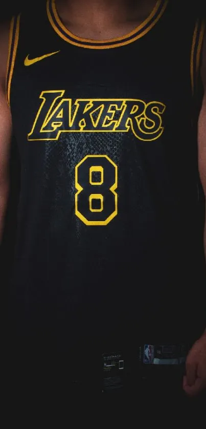 Black and yellow basketball jersey with the number 8.