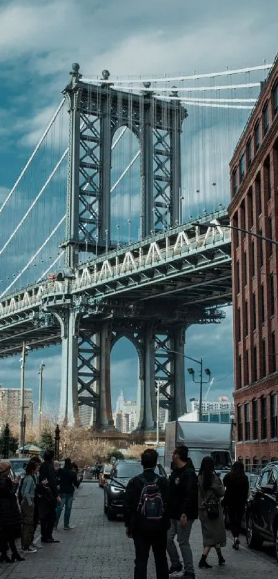 City street view with an iconic bridge overhead.