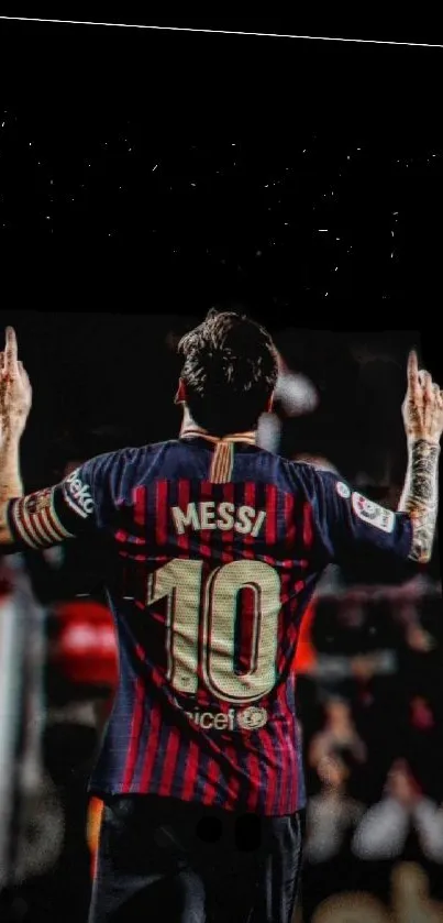 Football legend celebrates on field in dark-themed mobile wallpaper.