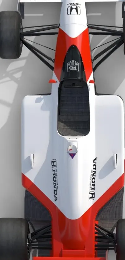 Top view of an iconic red and white racing car with a sleek design.