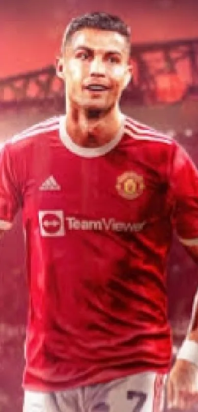 Soccer player in red jersey with stadium backdrop.