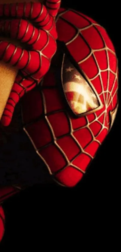Superhero in red suit on a mobile wallpaper.