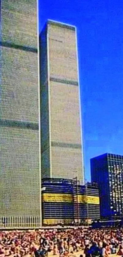 Twin Towers under a blue sky with a bustling city scene in the foreground.