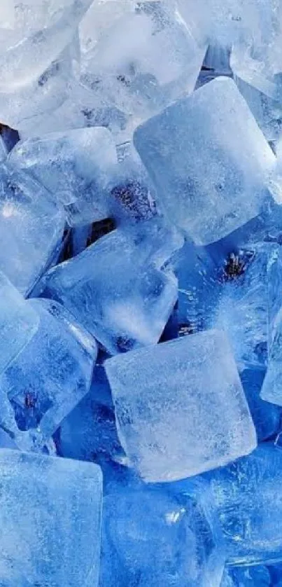 Pile of vibrant blue ice cubes with frosty textures.