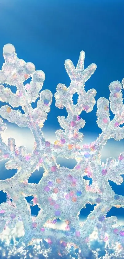 Close-up of detailed snowflake with vibrant blue background.