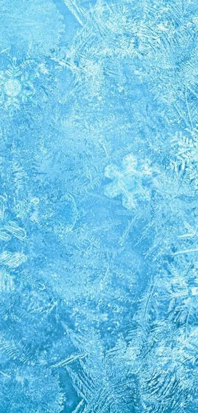 Intricate icy blue snowflake wallpaper pattern.