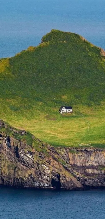 Scenic island view with house and ocean, perfect mobile wallpaper.