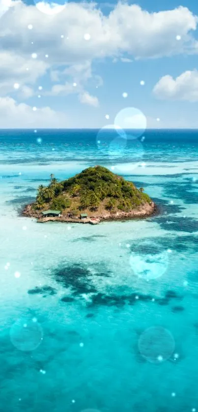 Aerial view of a tiny island surrounded by vibrant turquoise ocean.