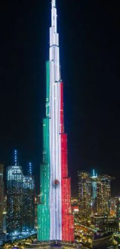 Burj Khalifa illuminated with colorful lights at night in Dubai.