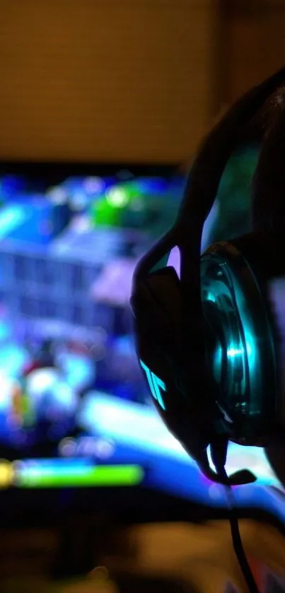 Close-up of a gamer wearing a headset, absorbed in colorful onscreen action.