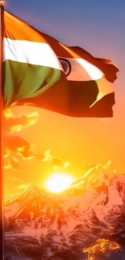 Indian flag waving at sunset over mountains.
