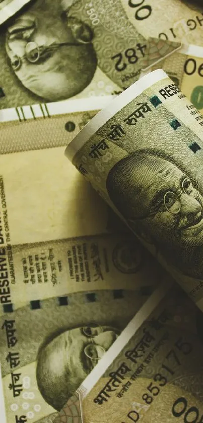 A vibrant wallpaper featuring Indian Rupee notes in various denominations.