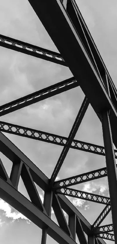 Black and white photo of a steel bridge with geometric patterns.