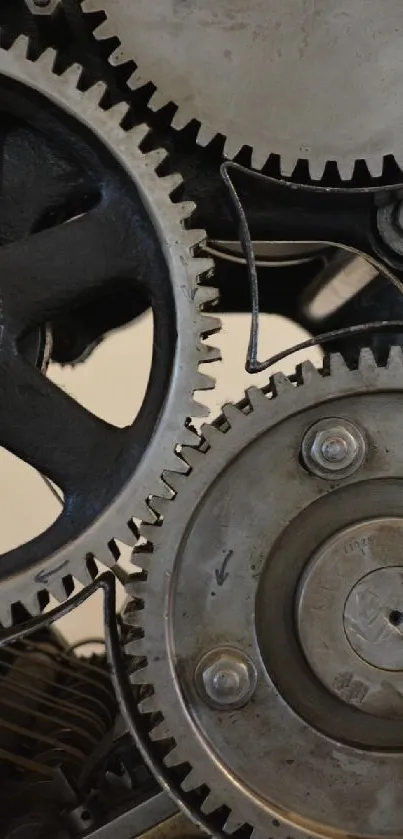 Close-up of industrial gears creating a mechanical pattern.