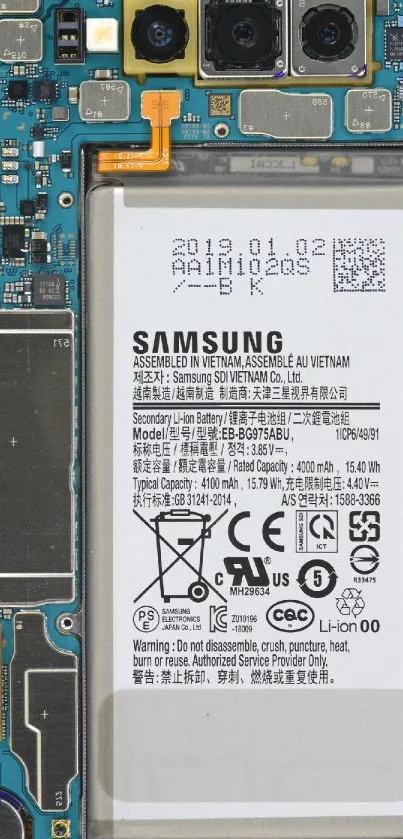 Close-up of smartphone circuit showing battery and components.