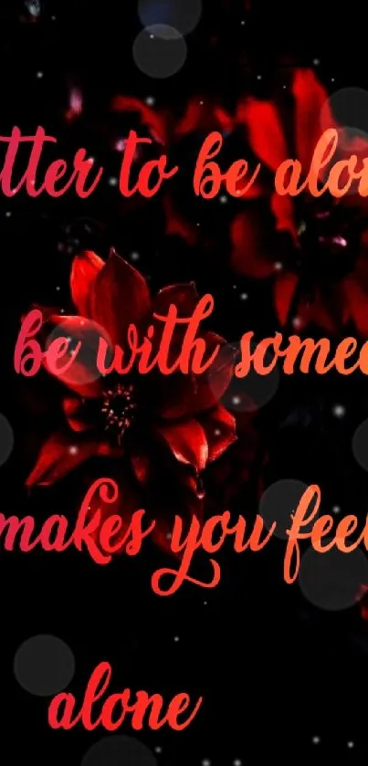 Inspirational wallpaper with red flowers and quote about solitude.