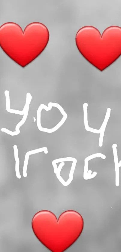 Gray wallpaper with red hearts and 'You Rock' message.