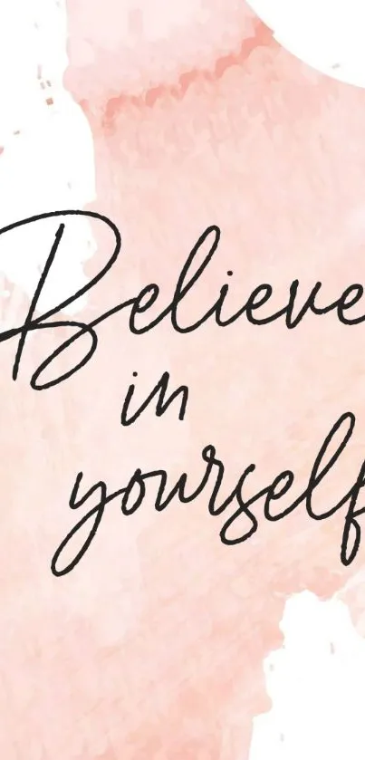 Believe in Yourself quote on soft pink watercolor background.