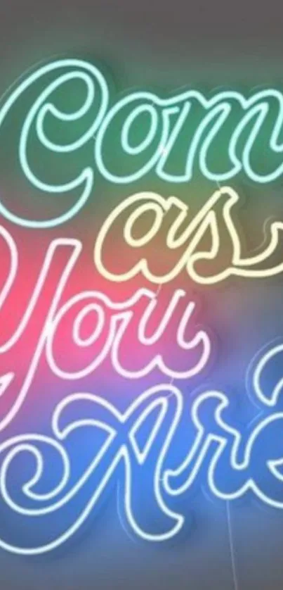 Vibrant neon text 'Come as You Are' in colorful glowing letters.