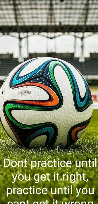 Vibrant soccer ball on lush green field with motivational quote.