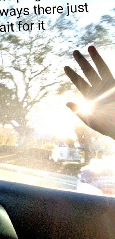 Hand reaching towards sunlight through car window with motivational text overlay.