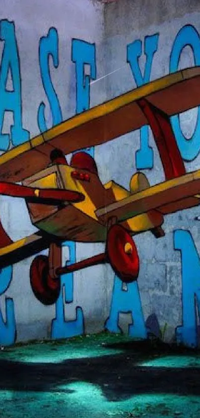 Airplane mural with 'Chase Your Dreams' text in vivid colors.