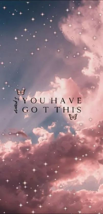 Motivational pink clouds wallpaper with sparkles and inspiring text.