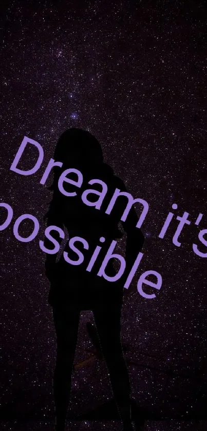 Motivational galaxy wallpaper with silhouette and 'Dream it's possible' text.