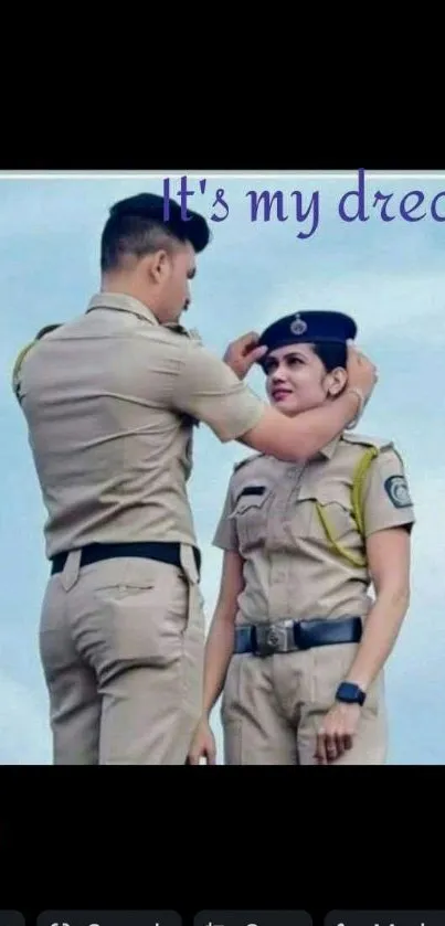 Two police officers in uniform against a blue sky with 'It's my dream' text.