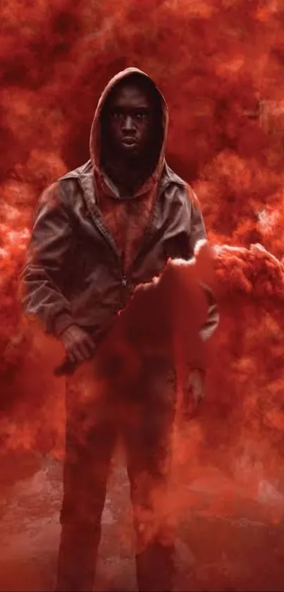 Person in a hoodie engulfed in red smoke on a mobile wallpaper.