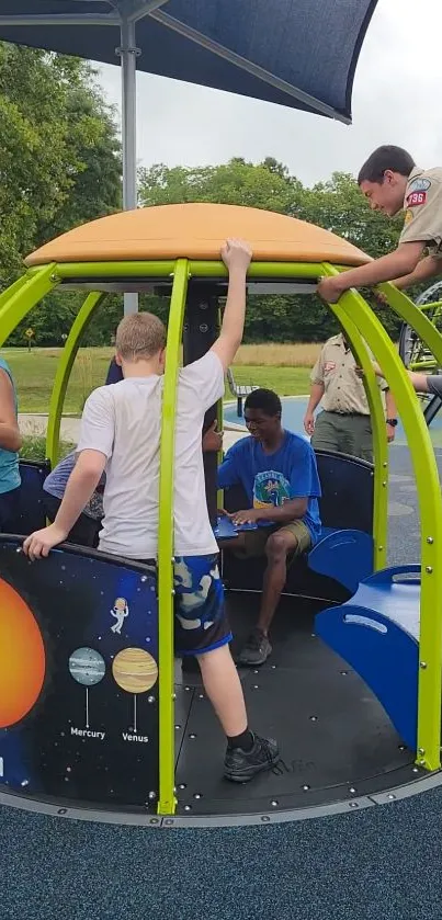 Children playing on an outdoor playground structure.