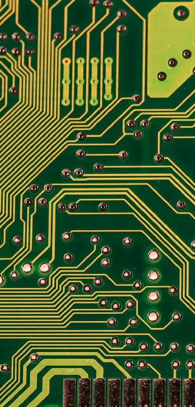 Circuit board design with green and gold lines on a phone wallpaper.