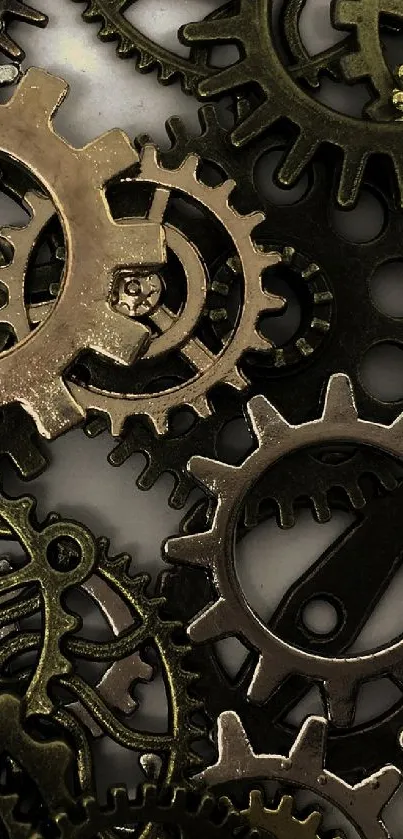 Intricate gears and cogs in metallic tones for mobile wallpaper.