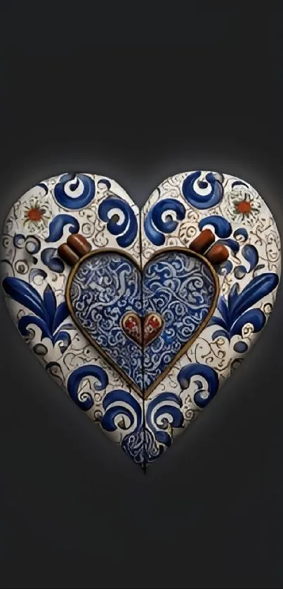 Intricate heart design with blue patterns on dark background.