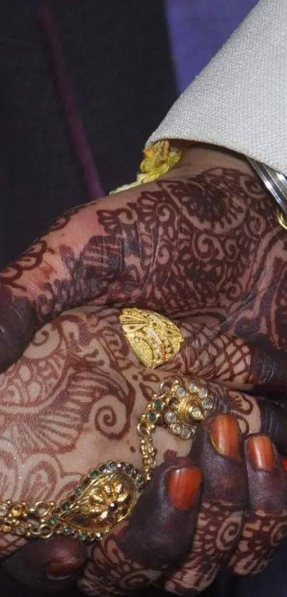 Detailed henna design on hands with jewelry and elegance.