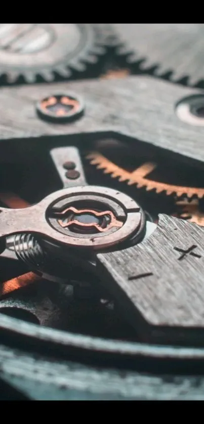 Close-up of intricate mechanical gears with metal texture for a mobile wallpaper.