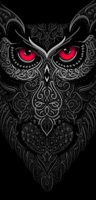 Intricately designed owl with red eyes on a black background wallpaper.