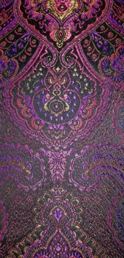 Intricate purple paisley pattern wallpaper with elegant design.