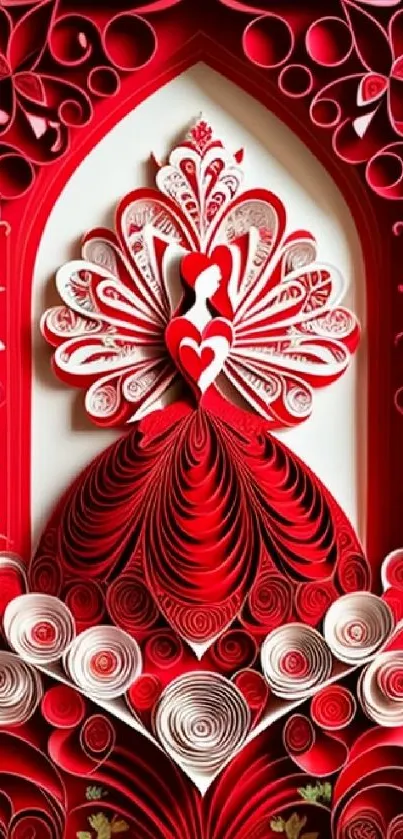 Intricate red paper art with floral and heart design.